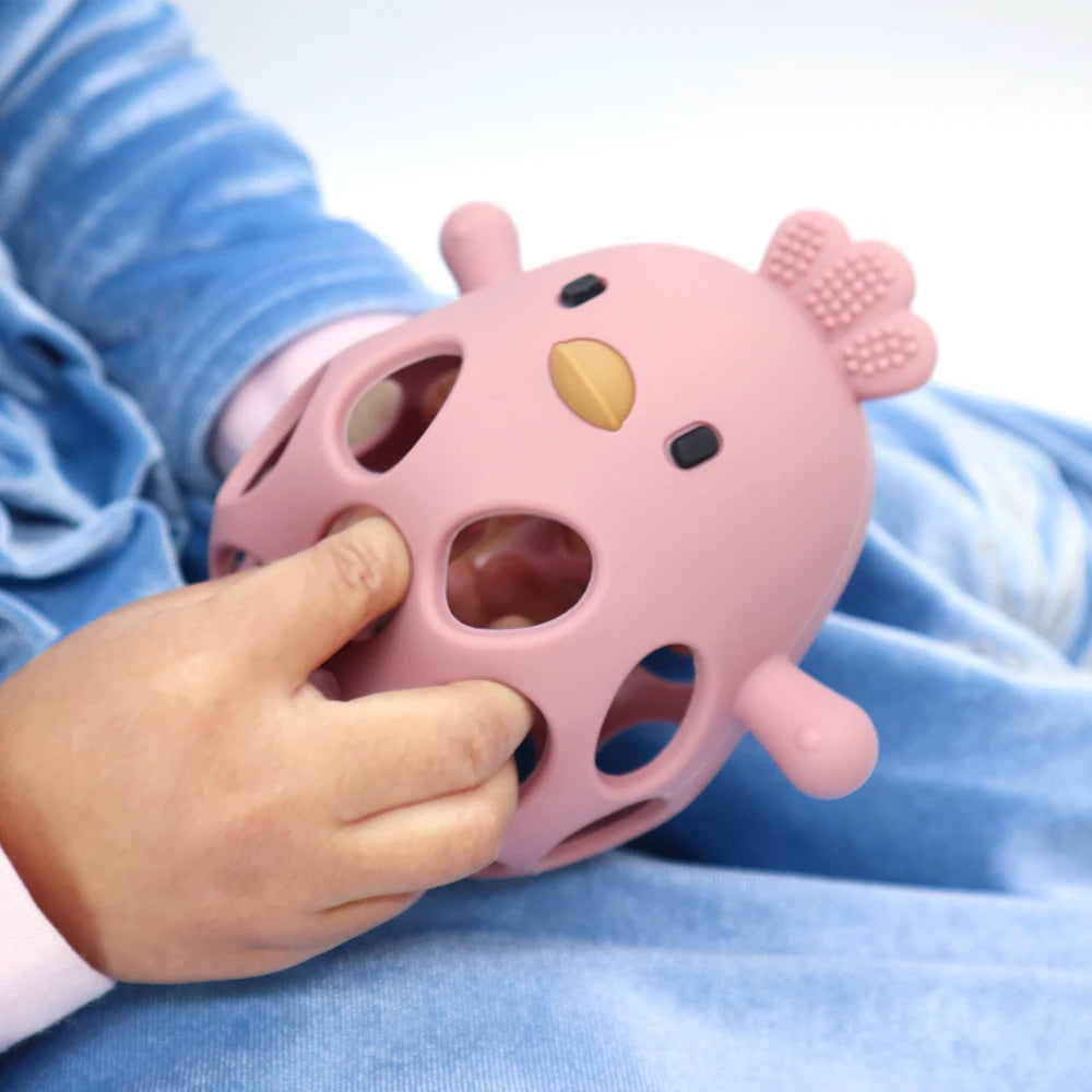 Anneau de dentition en silicone : soulage les gencives et amuse les petites mains !