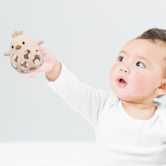 Anneau de dentition en silicone : soulage les gencives et amuse les petites mains !