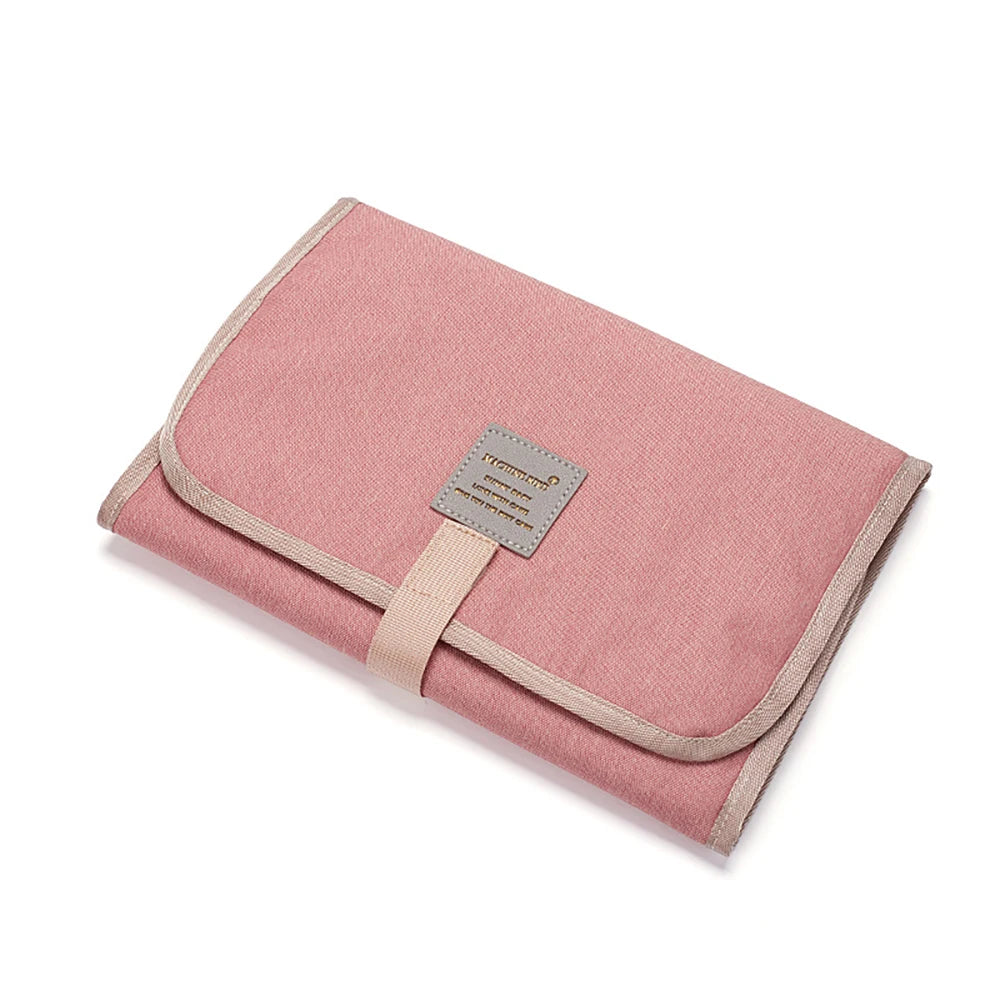 Changing mat: small and practical