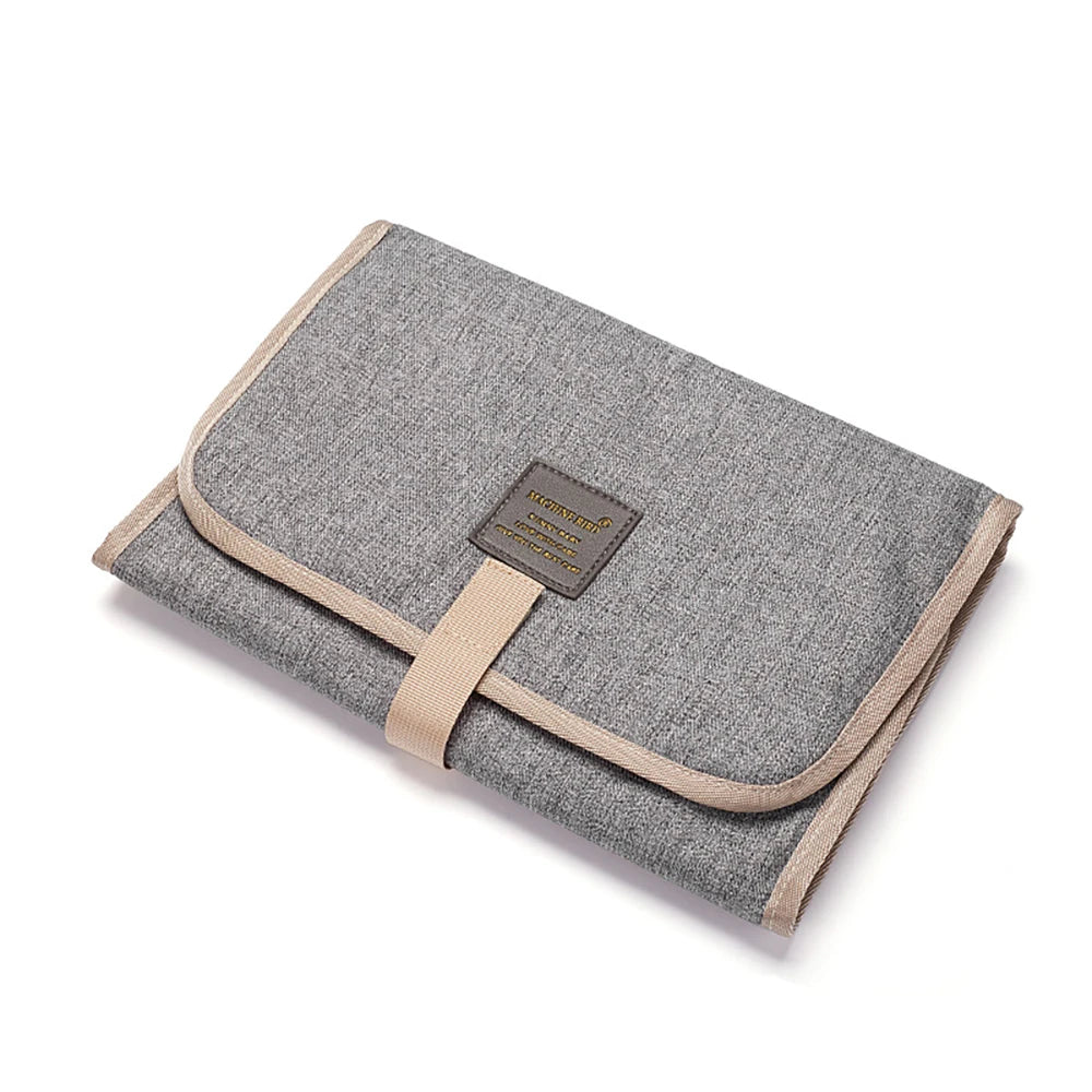 Changing mat: small and practical