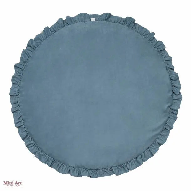 Round floor mat: softness and tenderness combined