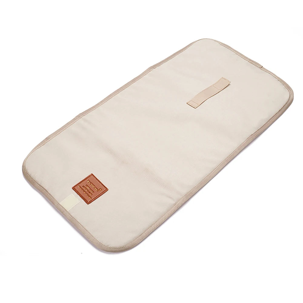 Changing mat: small and practical