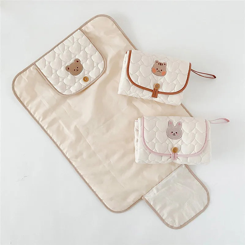 Changing mat: practical and convenient