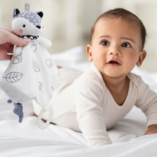 Doudou et anneau de dentition | douceur, réconfort et éveil sensoriel réunis