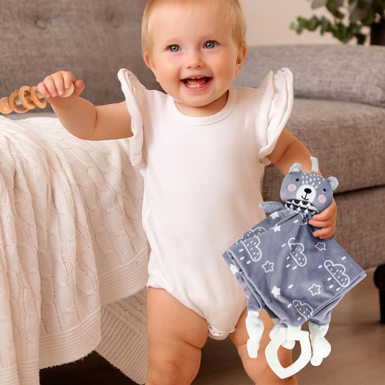 Doudou et anneau de dentition | douceur, réconfort et éveil sensoriel réunis